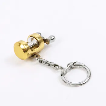 1 gab Radošo Zelta Krāsā Lidot Ruļļa Atslēgu piekariņi Velcēšanas Spoles Modeli Zvejas Metal Keychain Rīksti Nelielu Kulonu Zvejas Mīļāko